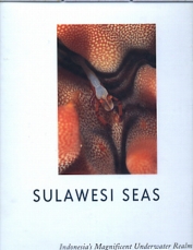 SULAWESI SEAS by Mike Severns. A Superbly photographed  160 page large format hardback book with slightly damaged dust cover. Hundreds of large photographic plates